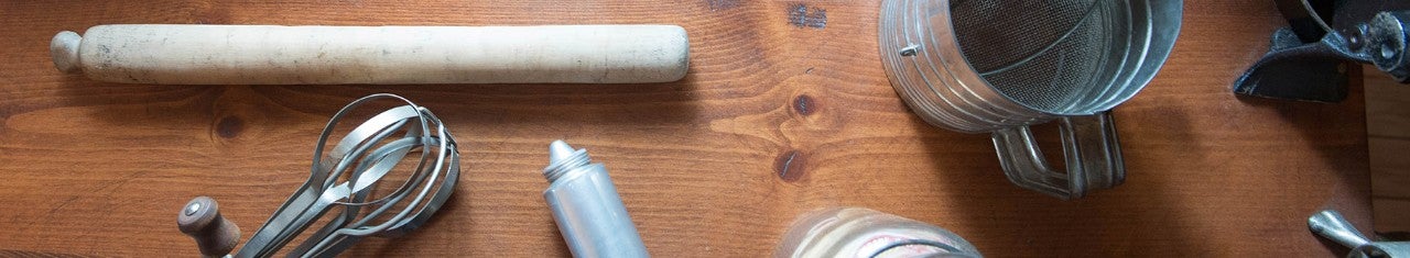 Kitchen instruments on top of a wooden table